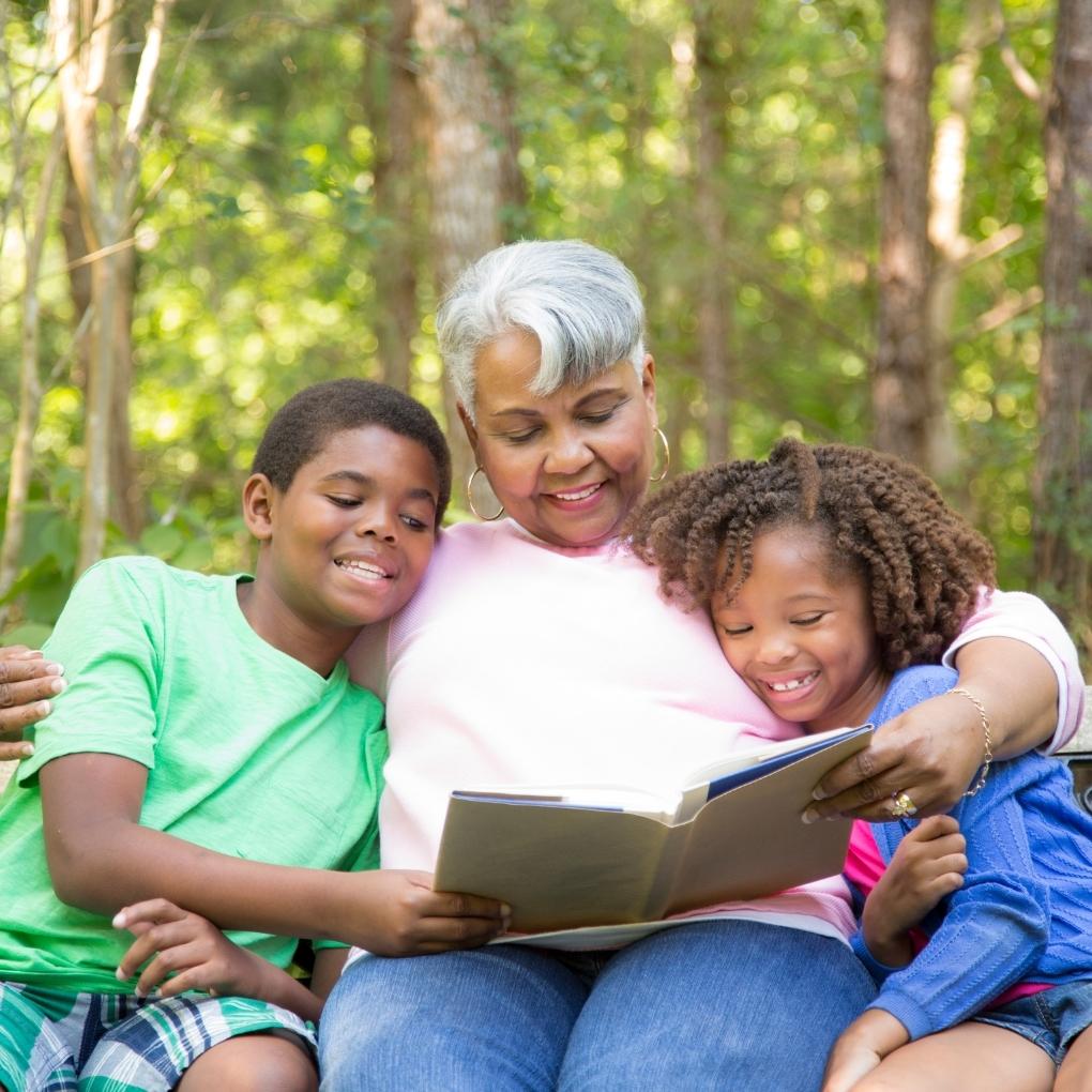 Grandmother reading to kids