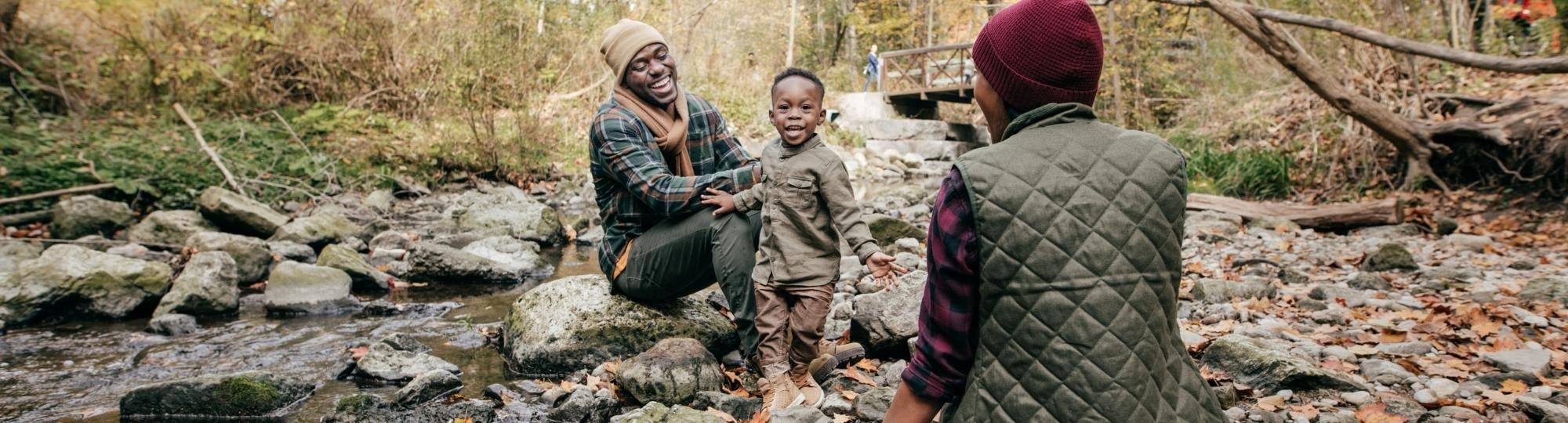 Family enjoying a creek