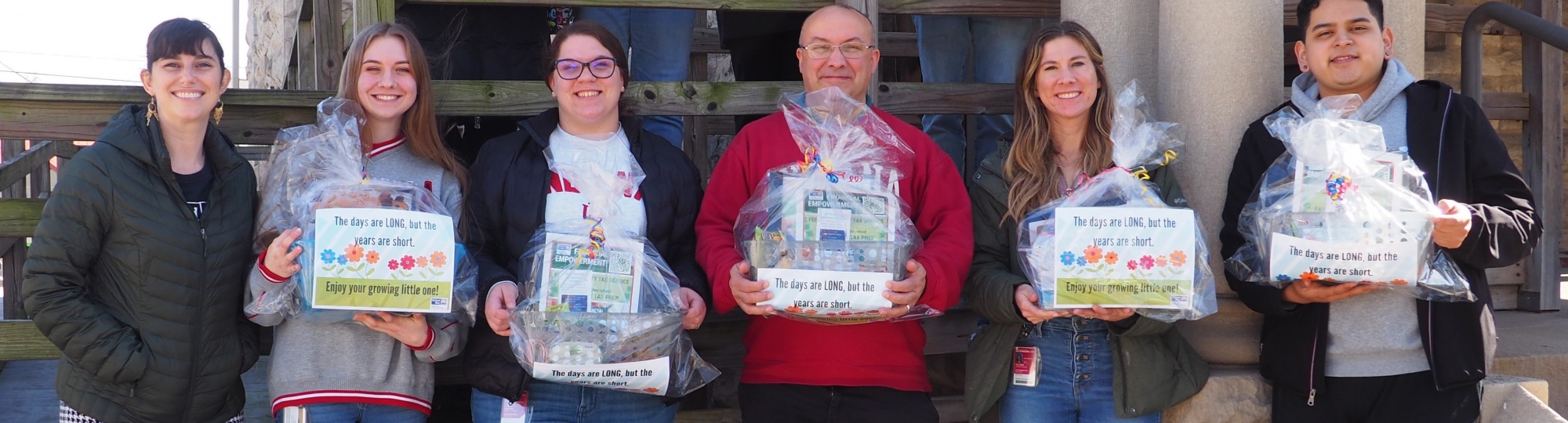 Group of Volunteers with Baby Baskets