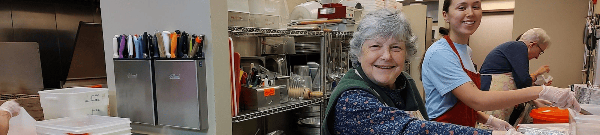 Volunteers working in kitchen