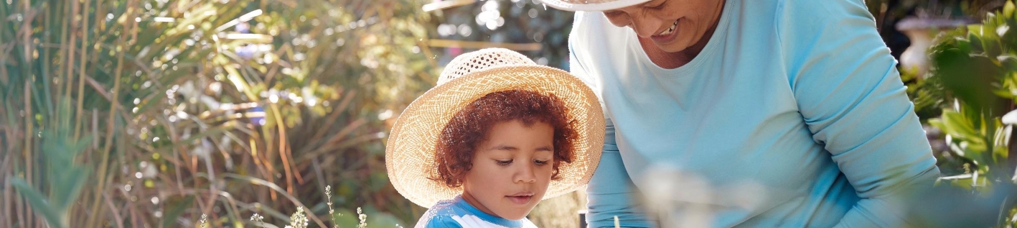 Grandmother and Granddaughter gardening together